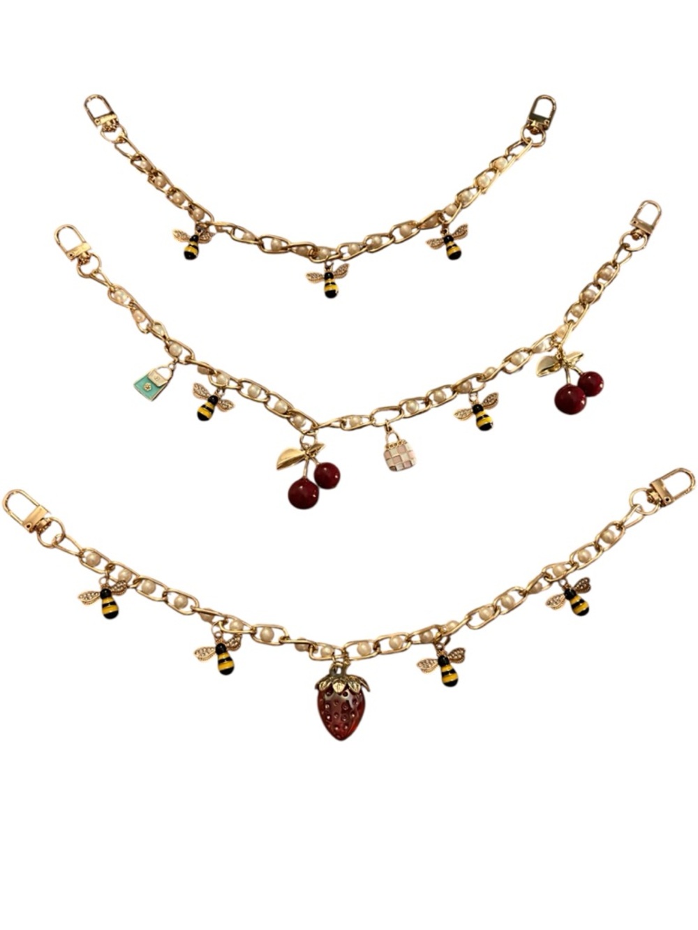 Made by YOLO Gold-Tone Handbag Charm Set of 3 w/ Cherry, Purses & Bee Charms